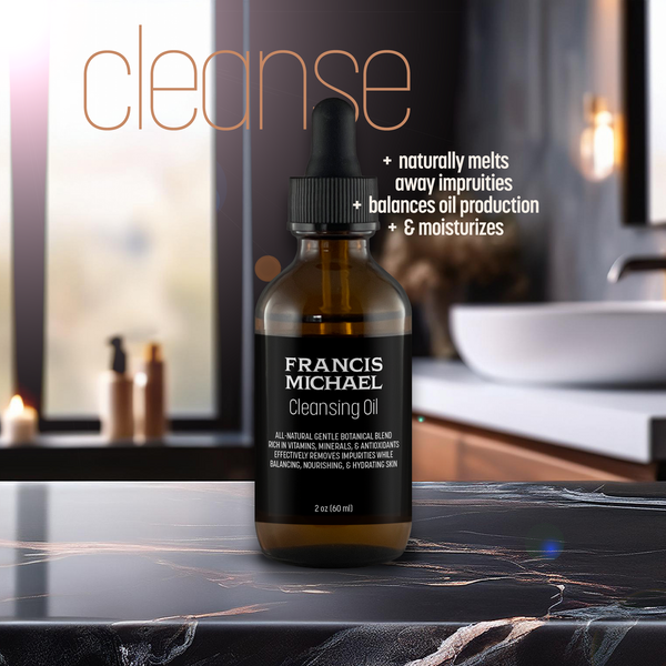 Francis Michael cleansing oil bottle on a bathroom counter with text about its benefits.