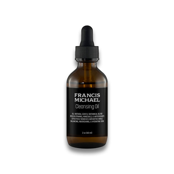 Brown glass bottle FRANCIS MICHAEL Cleansing Oil on a white background