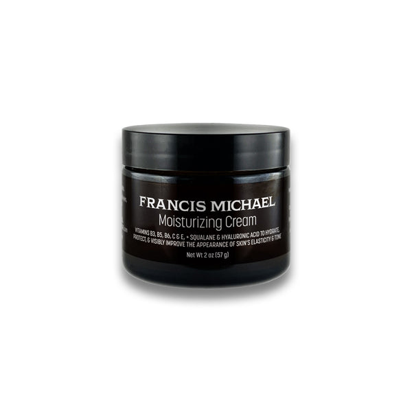 Black jar of Francis Michael moisturizing cream on a white background