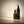 Two bottles of Francis Michael skincare products, Francis Michael Cleansing Oil and Francis Michael Clarifying Gel, on a beige background
