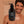 Bottle of Francis Michael hydrating lotion with a man on a beige background