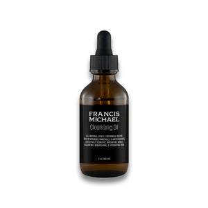 Brown glass bottle FRANCIS MICHAEL Cleansing Oil on a white background