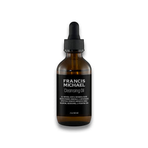 Brown glass bottle FRANCIS MICHAEL Cleansing Oil on a white background