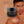 Francis Michael detoxifying mask with a man holding his chin on a beige background